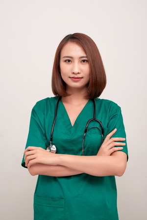 Portrait of an attractive young female nurse with stethoscopeの写真素材