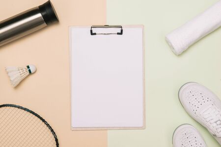 White running shoes with fitness accessories on light color background, Healthy conceptの写真素材