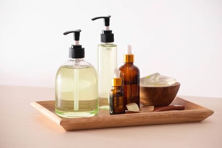 Gel shower and peeled aloe vera on a wooden backgroundの写真素材