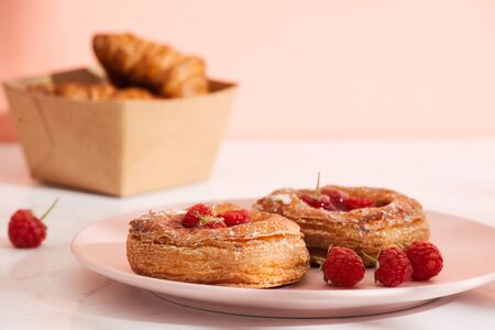 Homemade puff pastry with raspberries. Sweet tasty dessert. decorated with powdered sugar