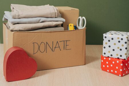 clothes in box for concept donation and reuse recycle