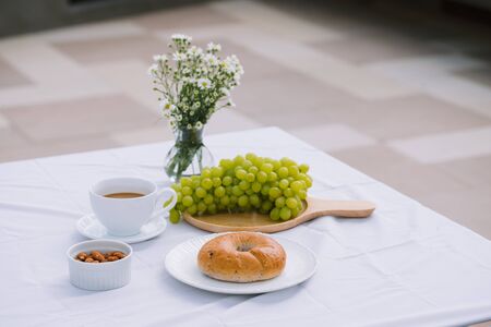 breakfast with coffee bread and fruitの写真素材