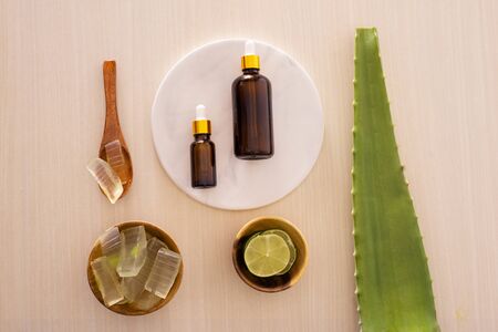bottle of aloe vera essential oil with peeled aloe - beauty treatmentの写真素材