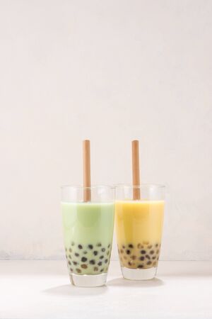 Variety of homemade bubble tea/ boba tea with tapioca pearls on white backgroundの写真素材