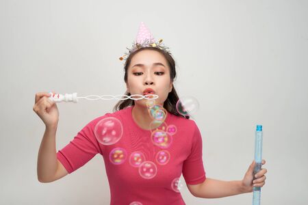 Joyful girl celebrating her birthdayの写真素材