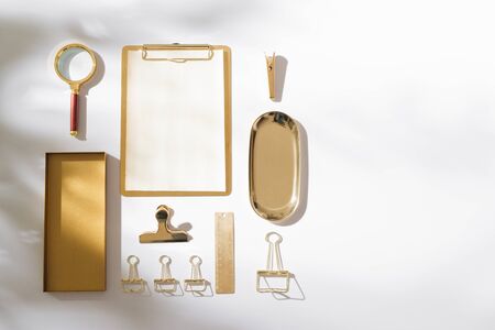 Stylish flatlay arrangement with planner, magnifying and other stationary accessoriesの写真素材