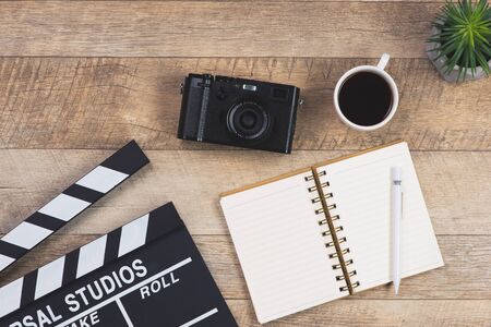 film director's desk on wood background. top view shotの写真素材