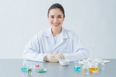Beautician preparing natural cosmetics, closeup