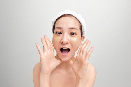 Spa skin care beauty woman wearing hair towel after beauty treatmentの写真素材