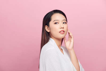 Beautiful young woman with shine of the skinの写真素材