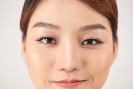 healthy woman skin beauty face beautiful eyes lips clean skin natural fashion make up spa female young modelの写真素材