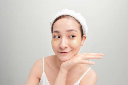 Spa skin care beauty woman wearing hair towel after beauty treatmentの写真素材
