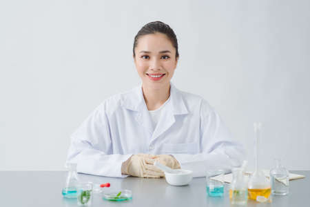 the scientist, dermatologist formulate organic natural cosmetic product in the laboratoryの写真素材