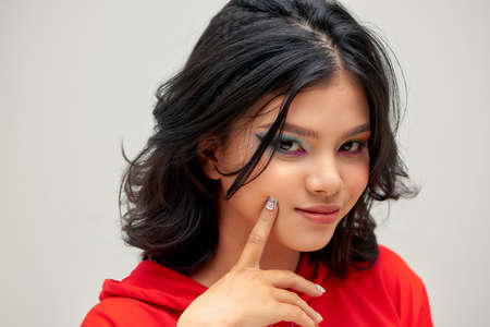 Dark hair beautiful woman with amazing eyeshadow makeup