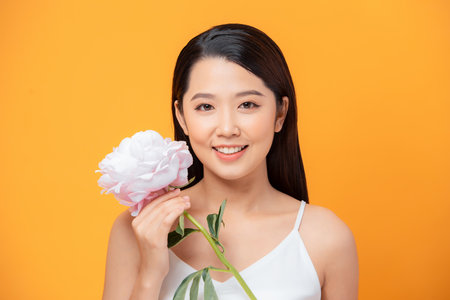 woman holding peony bouquetの写真素材