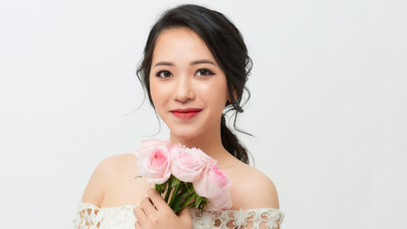 A woman looks at the cameraの写真素材