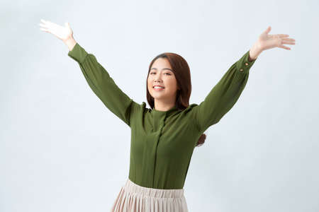 Young beautiful happy girl portrait isolated on whiteの写真素材