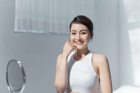 Beauty concept of an asian woman. Beauty salon. Skin care. Body care.の写真素材