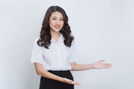 Image of gorgeous woman in smart casual looking at camera