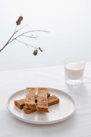 Morning Breakfast set with bread toast and milk in glass.の写真素材