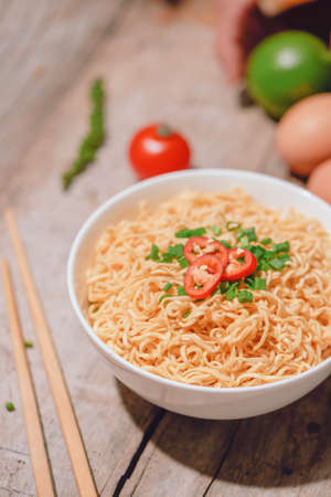 Concept of tasty eating with bowl of noodlesの写真素材