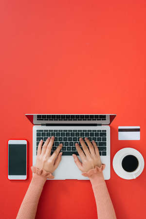 Woman typing on computer keyboard selective focus on hand, can be used for e-commerce, business,...