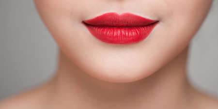 Beautiful Woman Face With Red Lipstick On Plump Full Sexy Lipsの写真素材