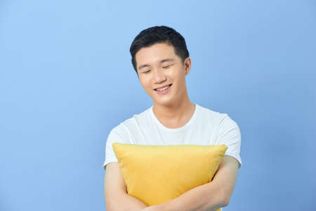 The man loves his pillow.の写真素材