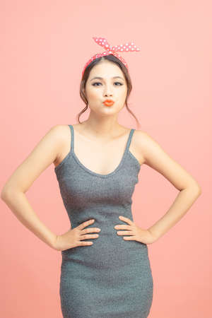 happy cute woman smile empty space wear headband isolated on pink background