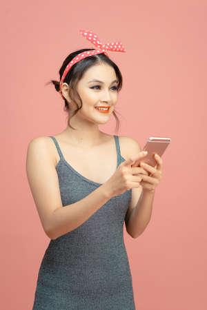 Asia woman using mobile phoneの写真素材