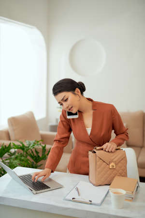 A girl is preparing for a meeting with clientsの写真素材