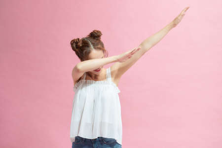 People sincere emotions lifestyle concept. Mock up copy space. Showing DAB dance gestureの写真素材