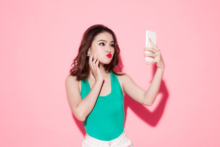 a beauty girl taking selfieの写真素材
