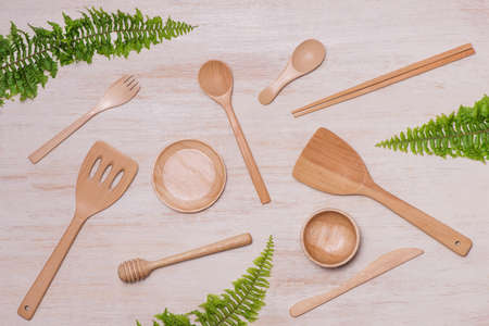 pile of wooden kitchen utensils photographed from aboveの写真素材