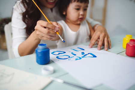 Happy family having fun time at homeの写真素材