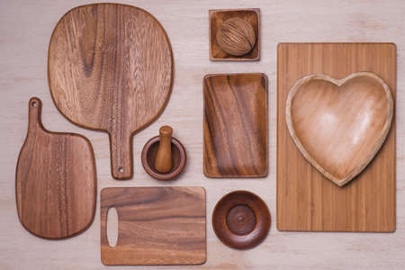 Set of wooden plates on wooden backgroundの写真素材