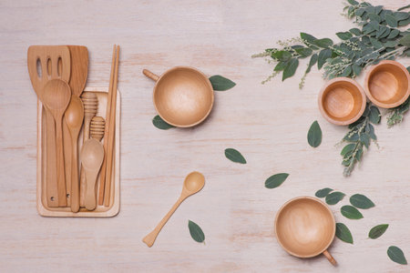 pile of wooden kitchen utensils photographed from aboveの写真素材