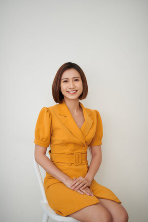 picture of young businesswoman sitting in chairの写真素材