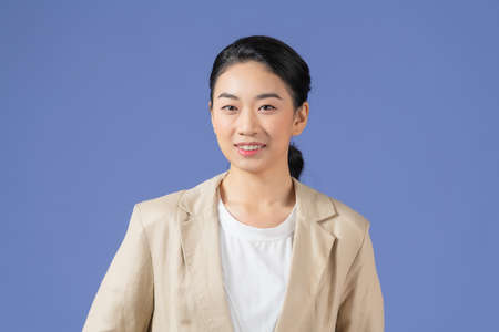 Photo of self-assured freelancer lady crossed arms wear khaki suit isolated purple color backgroundの写真素材