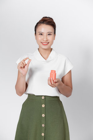 Woman with bottle pills productの写真素材