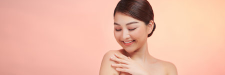 skincare and makeup concept beautiful asian female woman with healthy facial skin close up portrait studio shotの写真素材