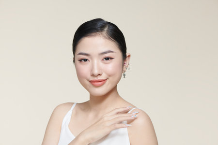 Beautiful young asian woman with clean fresh skin on white background,の写真素材