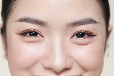 A half of a beautiful female's face with eye bagsの写真素材