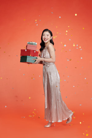 young beautiful stylish sexy woman in party dress celebratingの写真素材