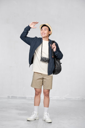 Portrait of young Asian man travelingの写真素材