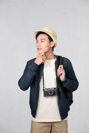 portrait of happy tourist photographer man on white backgroundの写真素材
