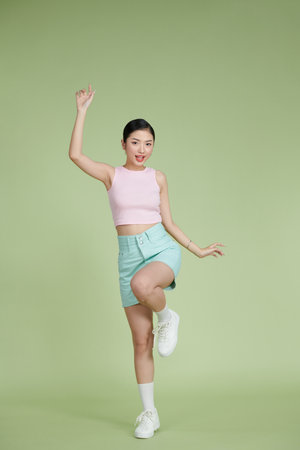 Attractive young woman relax and dance on copy spaceの写真素材