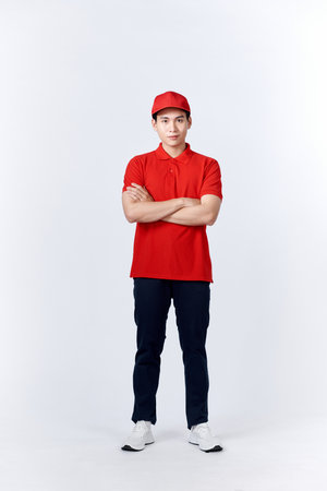 Asian Man in Blue Uniform. White Background.の写真素材