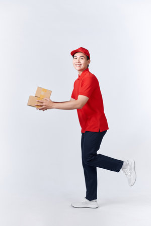 Happy man holds a lot of received packagesの写真素材