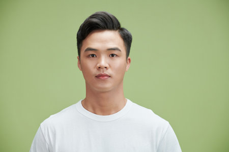 Portrait of a young handsome asian manの写真素材